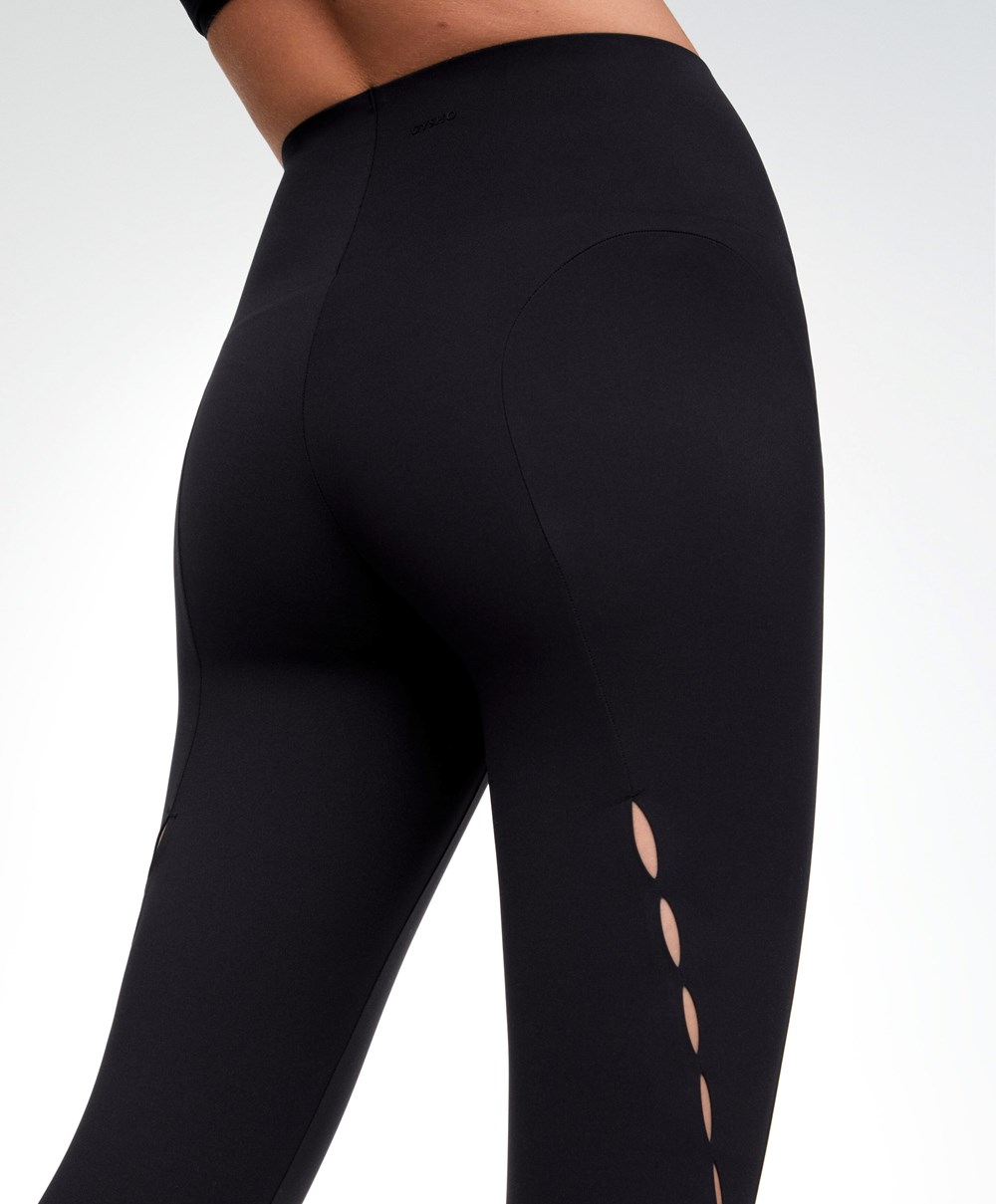 Black Oysho 65cm Cut-out Compressive Ankle-length Leggings | EWPB76954