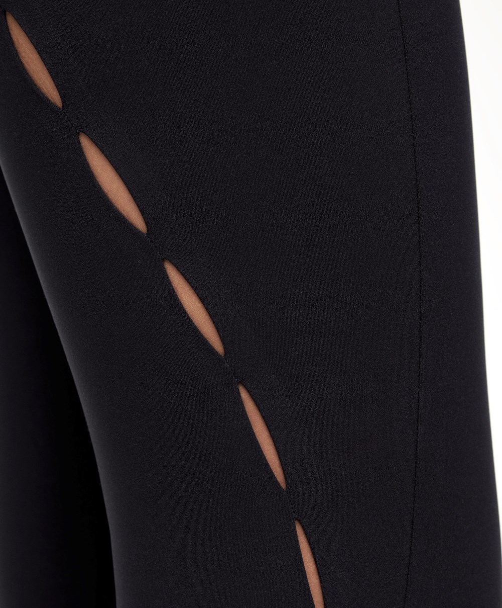 Black Oysho 65cm Cut-out Compressive Ankle-length Leggings | EWPB76954