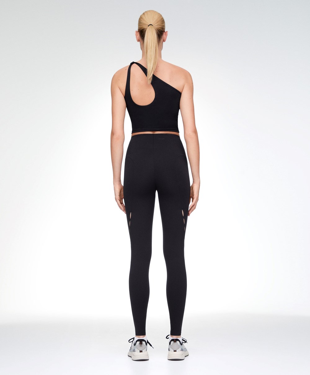 Black Oysho 65cm Cut-out Compressive Ankle-length Leggings | EWPB76954